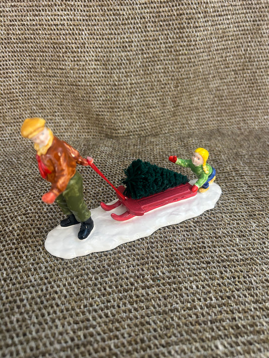 Bringing Home The Tree.
