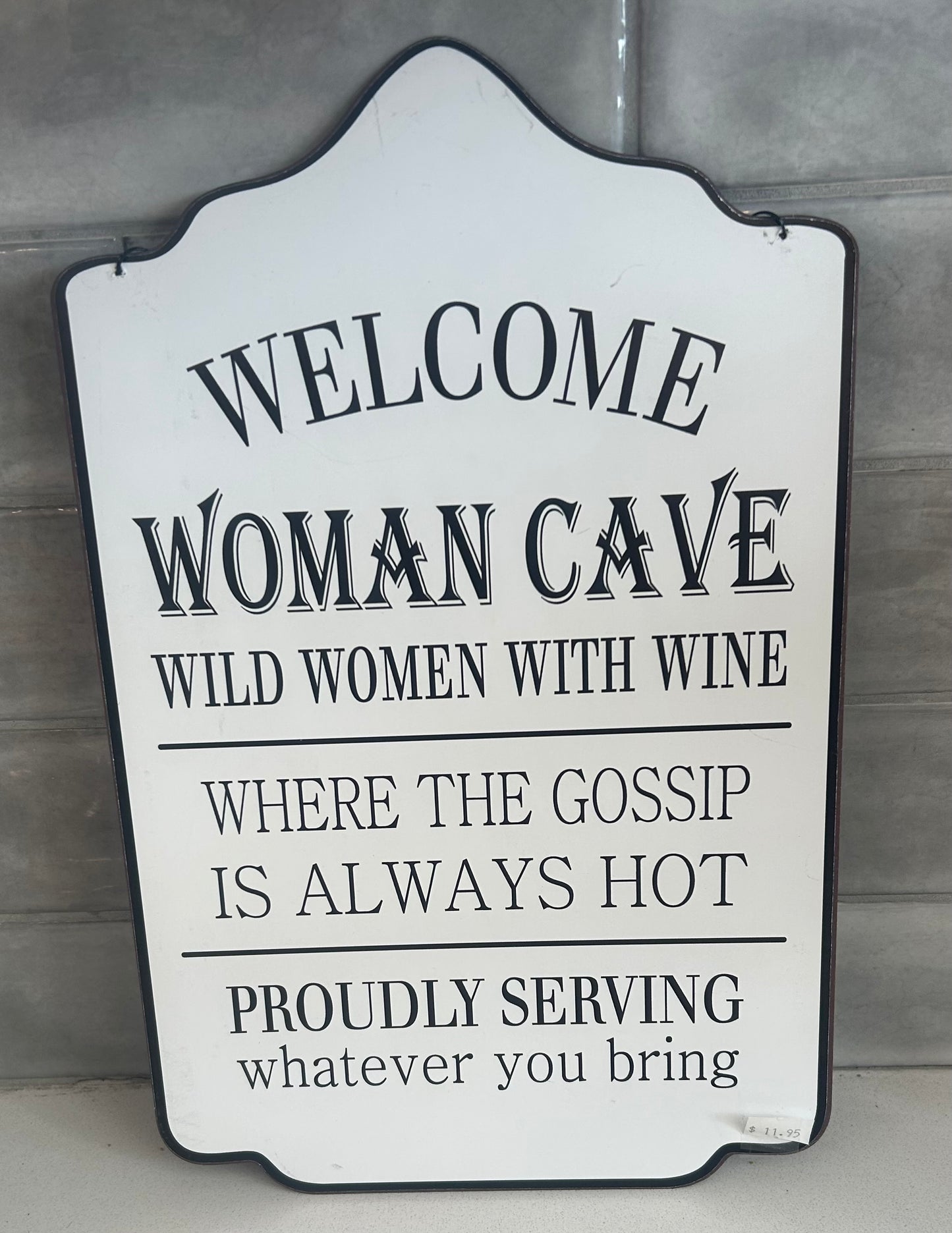 Woman Cave sign