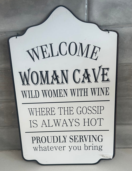 Woman Cave sign